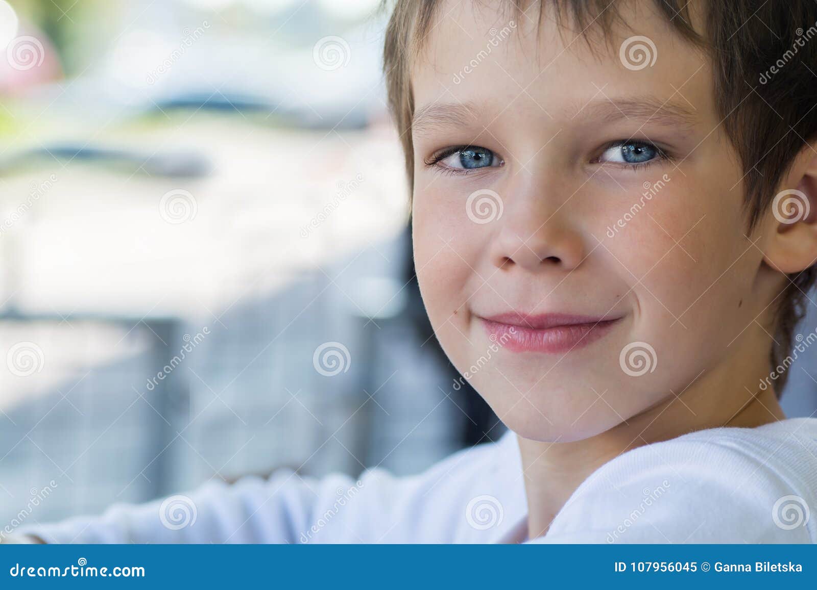 Portrait of a Beautiful Baby Boy Model in White Clothes with a ...