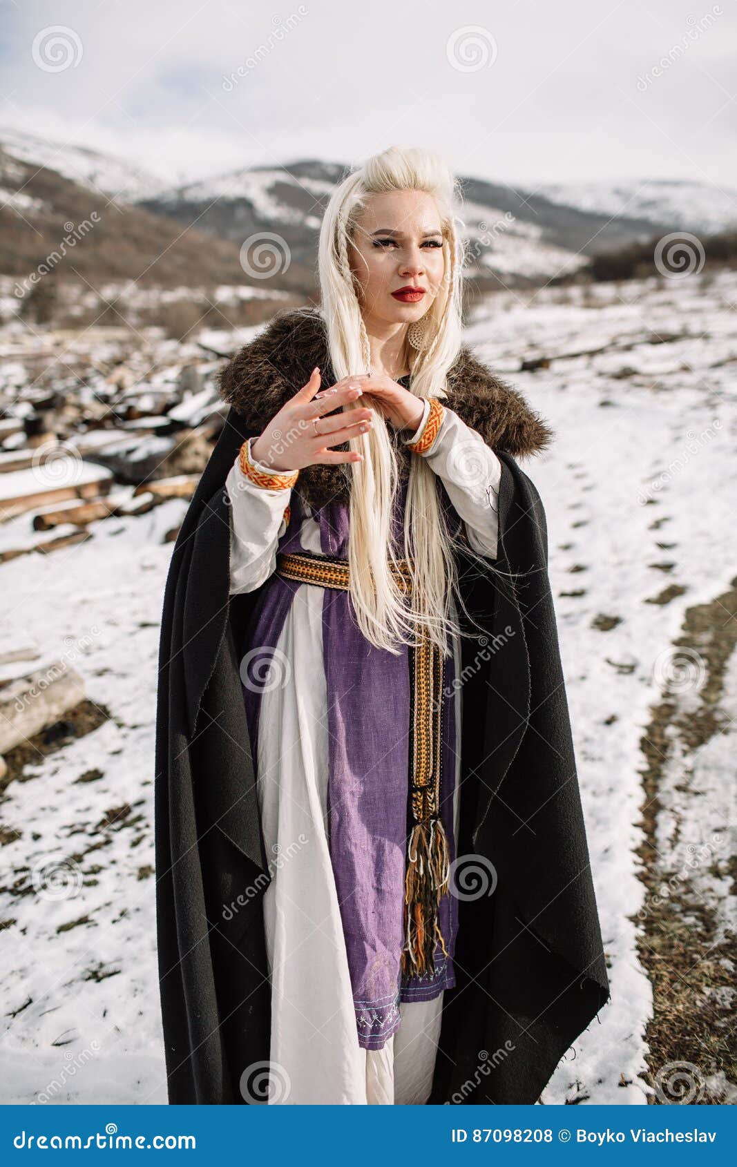 Portrait of a Beautiful Blonde in a Black Cape, Viking Stock Photo ...