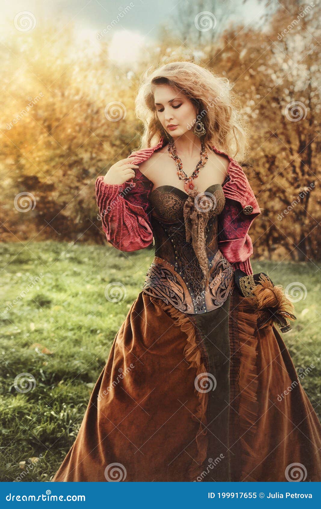 portrait of a beautiful blonde woman in a historical costume in nature,