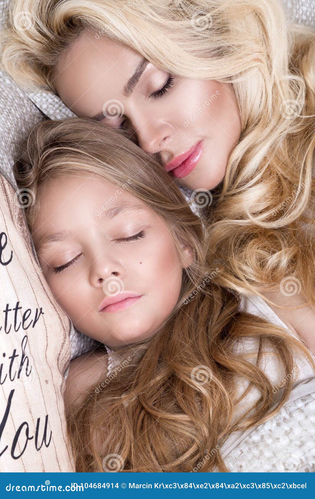 Portrait Of The Beautiful Blonde Woman Mother And Daughter On The Beautiful Face And Amazing 