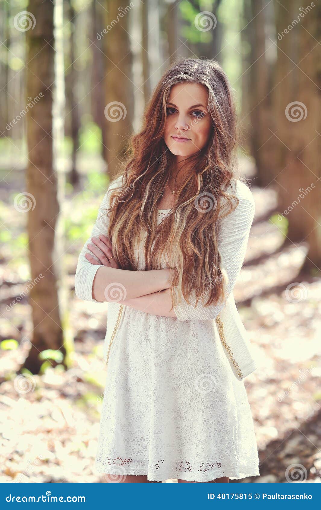 Portrait of Beautiful Blonde Woman in White Dress in the Wood Stock ...