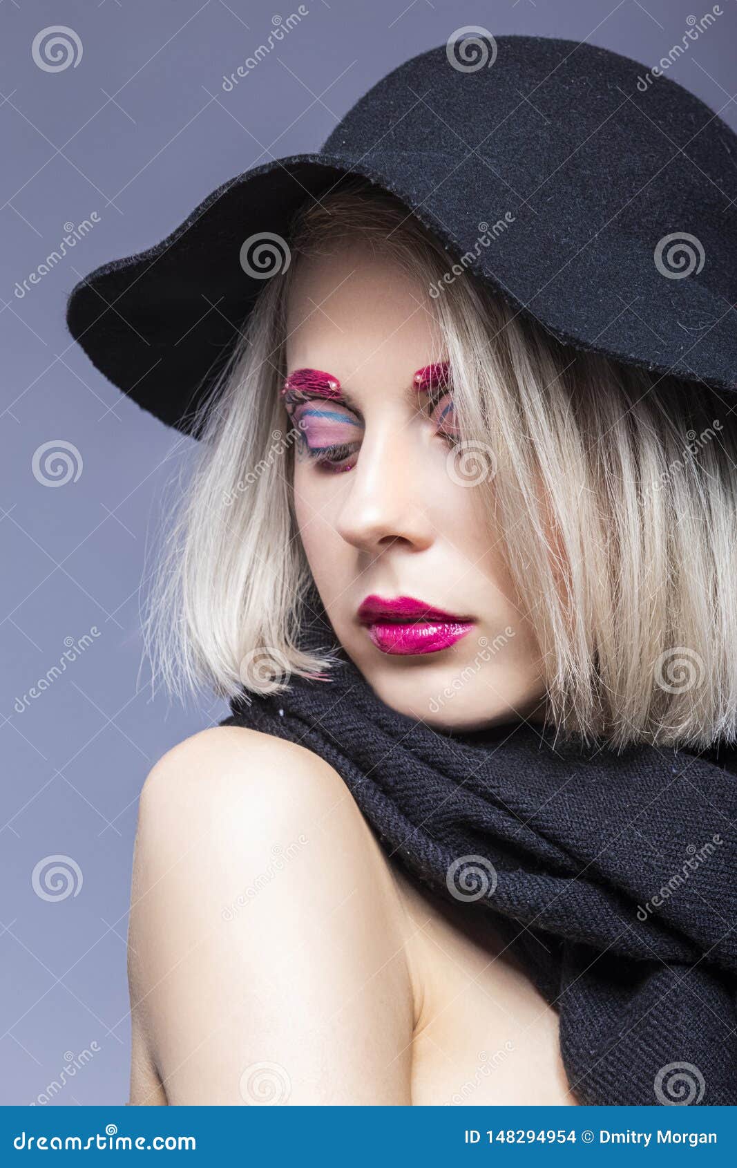 Portrait of Beautiful Caucasian Blond Girl in Black Hat Over Gray ...