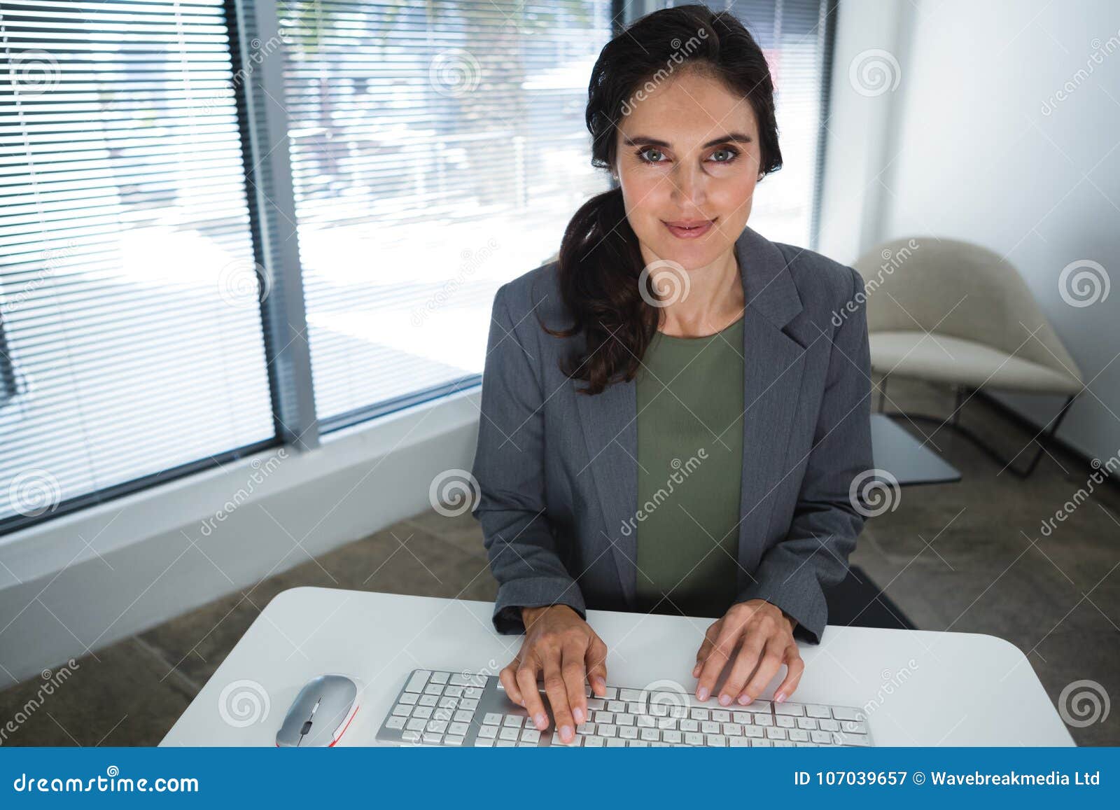 Beautiful Female Executive Working at Desk Stock Image Image of