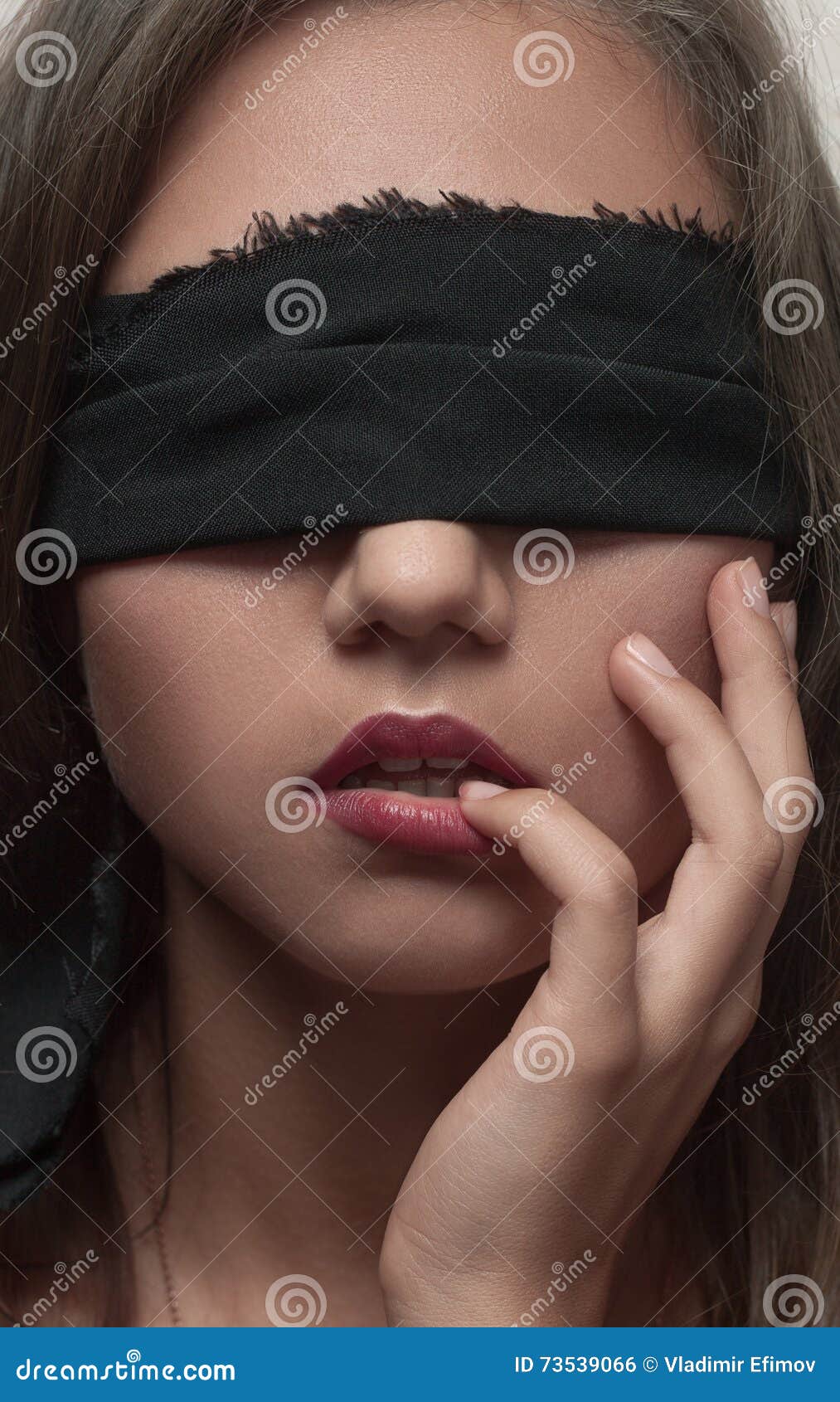 A Blindfolded Woman with Her Hands on Her Face · Free Stock Photo