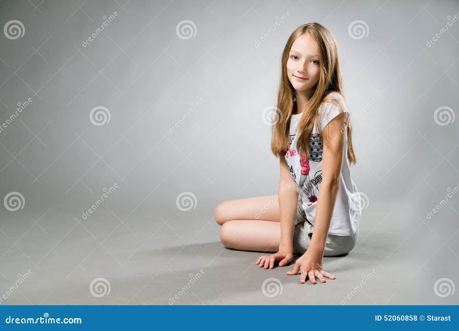 Portrait of a Beautiful Girl on a Gray Background Stock Photo - Image ...