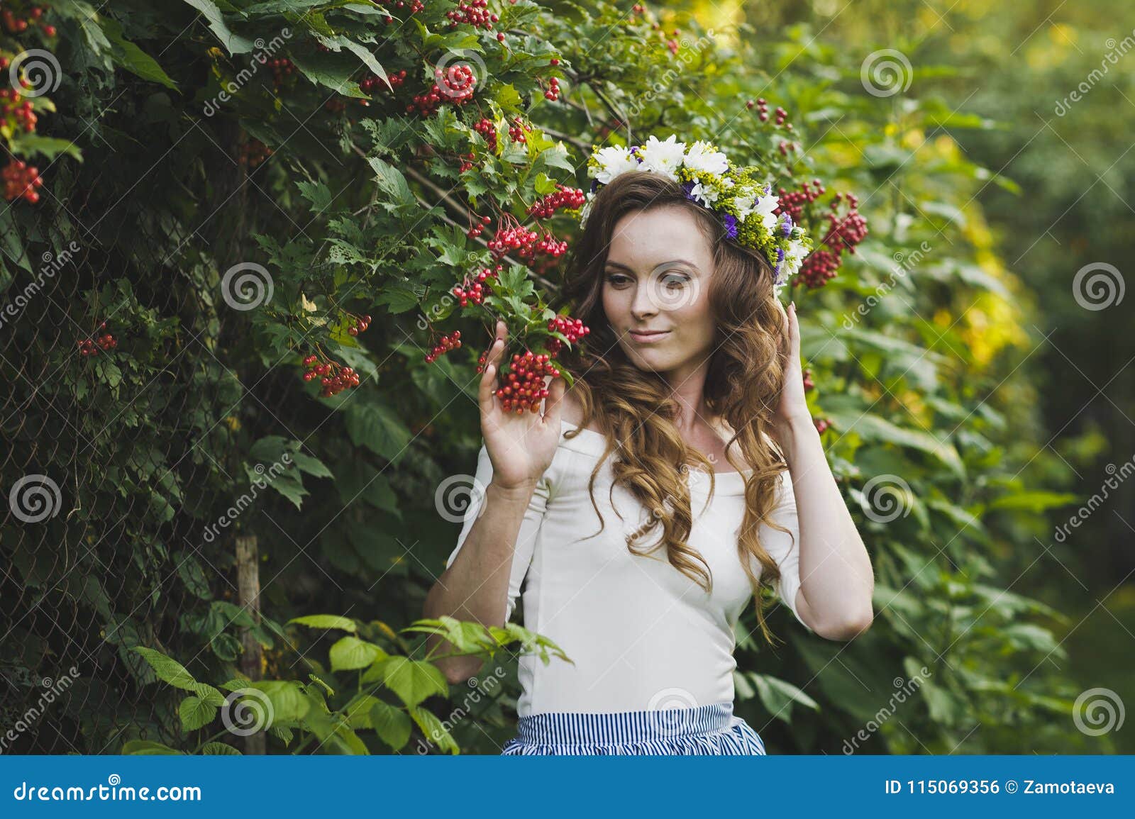 Portrait Of A Girl With A Wreath On His Head In The Garden Stock Photo Image Of Leaf