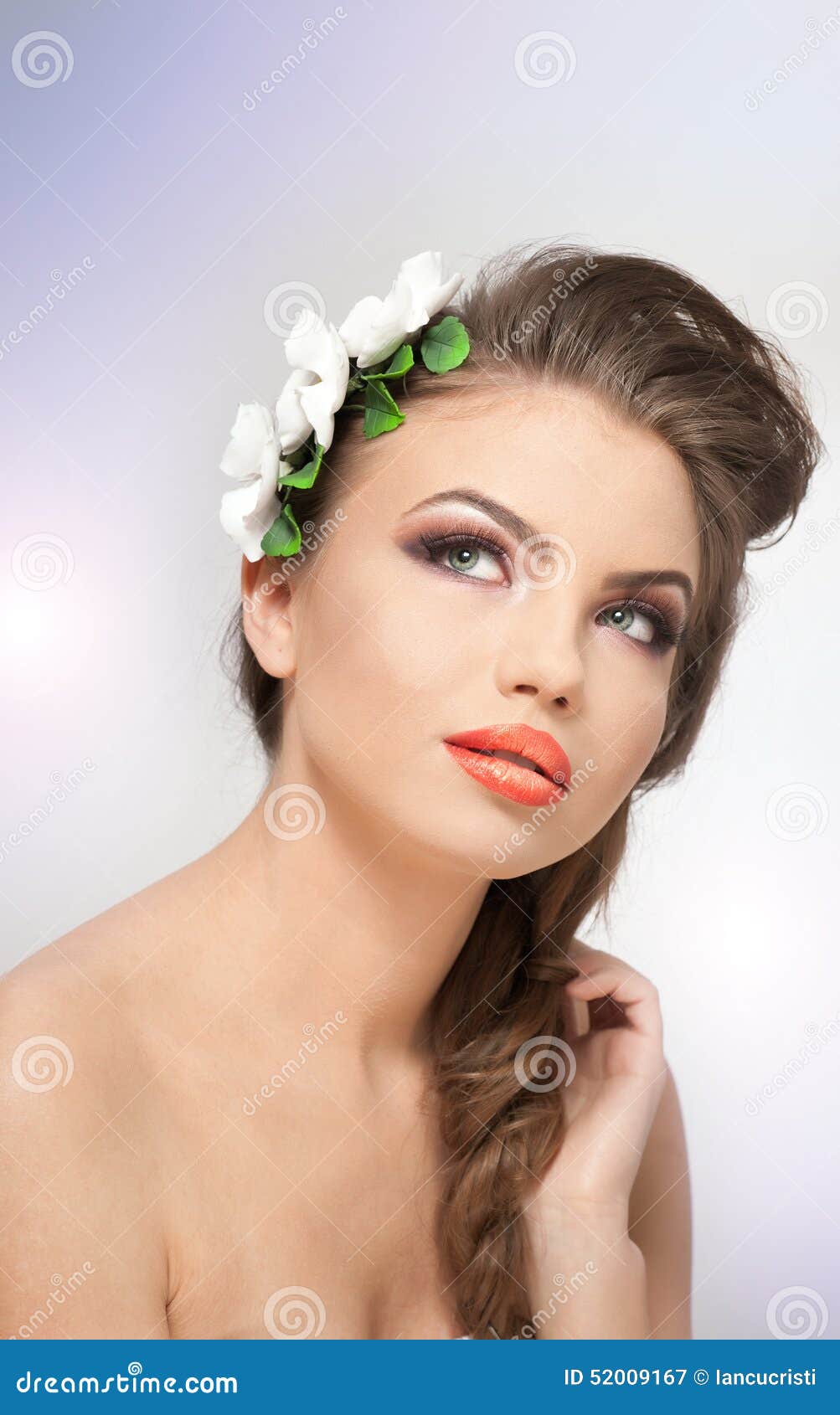 Portrait Of Beautiful Girl In Studio With White Flowers 