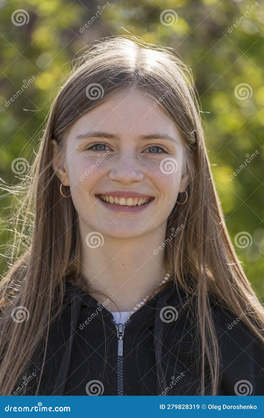 Portrait of a Beautiful Happy Girl with Blond Hair and Freckles Looking ...