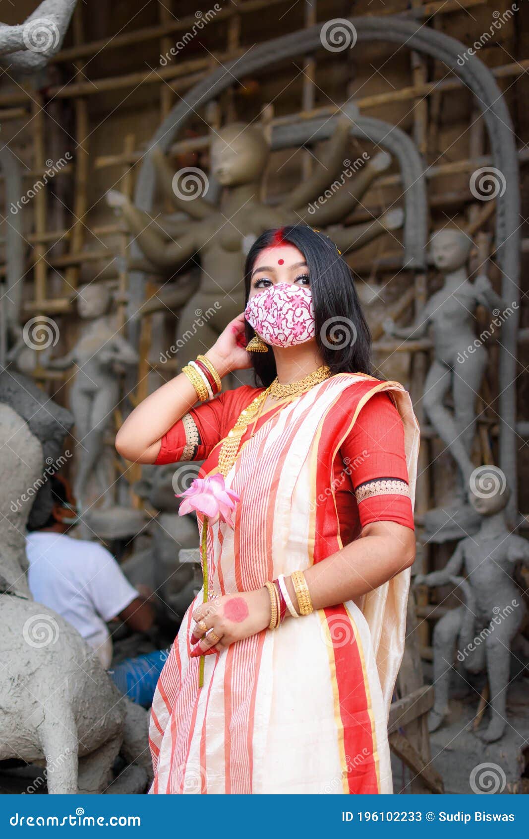 Portrait of Beautiful Indian Girl Standing in Front of Durga Idol ...