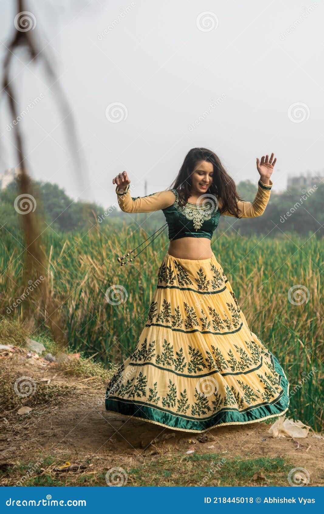 Green and Yellow Lehenga and Embroidered Choli from Gujarat with Printed  Dancing Village Girls | Exotic India Art