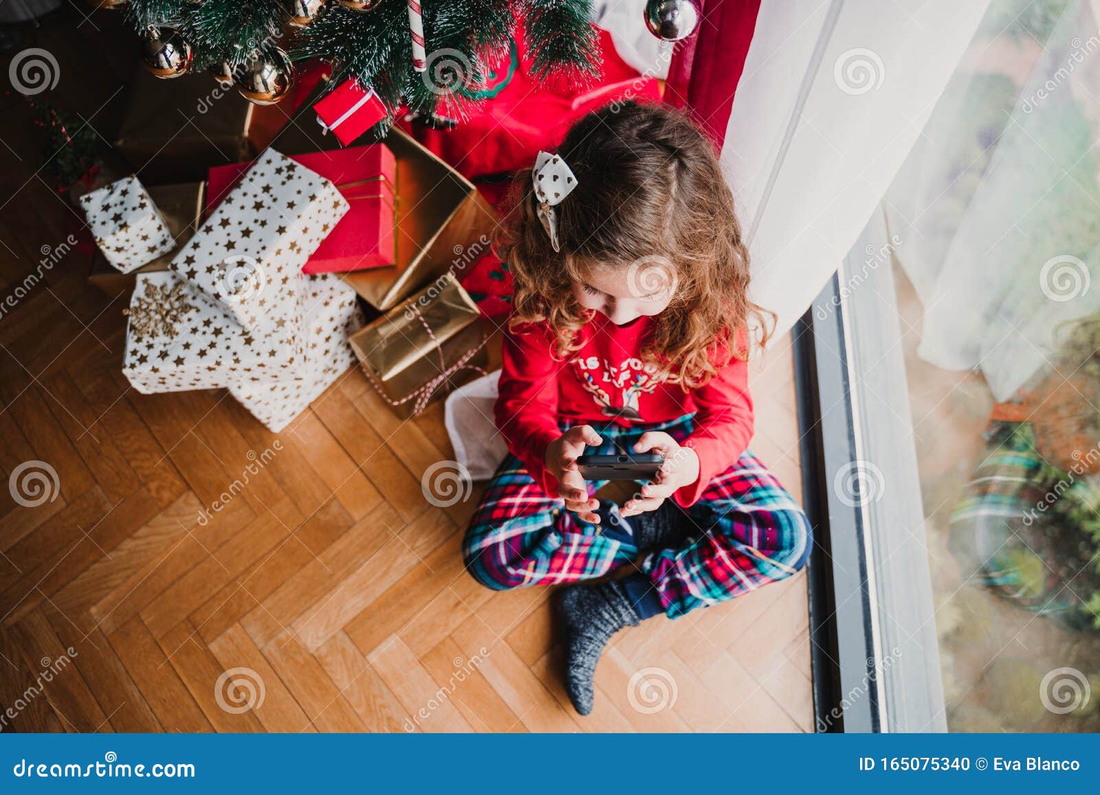 Portrait of Beautiful Kid Girl at Home by the Christmas Tree and ...