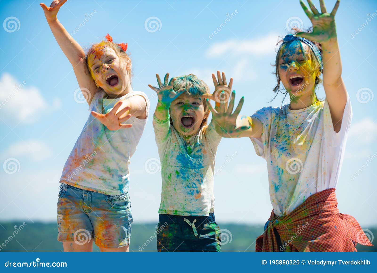 Portrait of a Beautiful Kids Showing Colorful Colored Hands. Happy ...