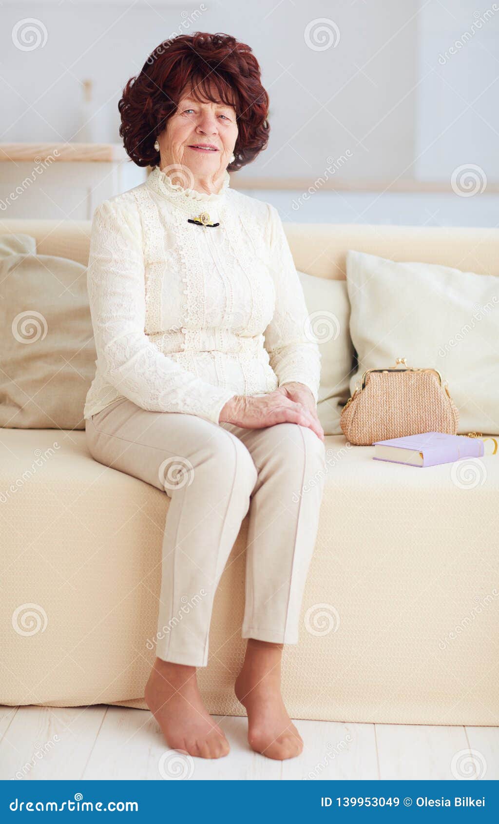 Portrait of Beautiful Mature Woman 80 Years Old Sitting on Sofa at Home  Stock Image - Image of attractive, life: 139953049