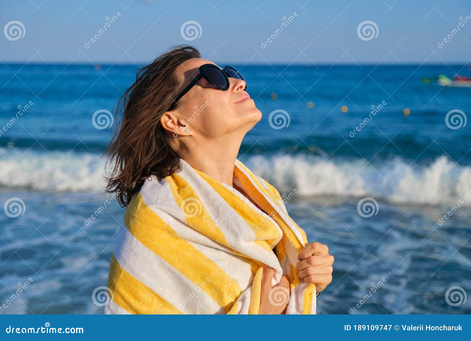 Portrait of Beautiful Middle Aged Woman Resting on Beach Stock Image ...