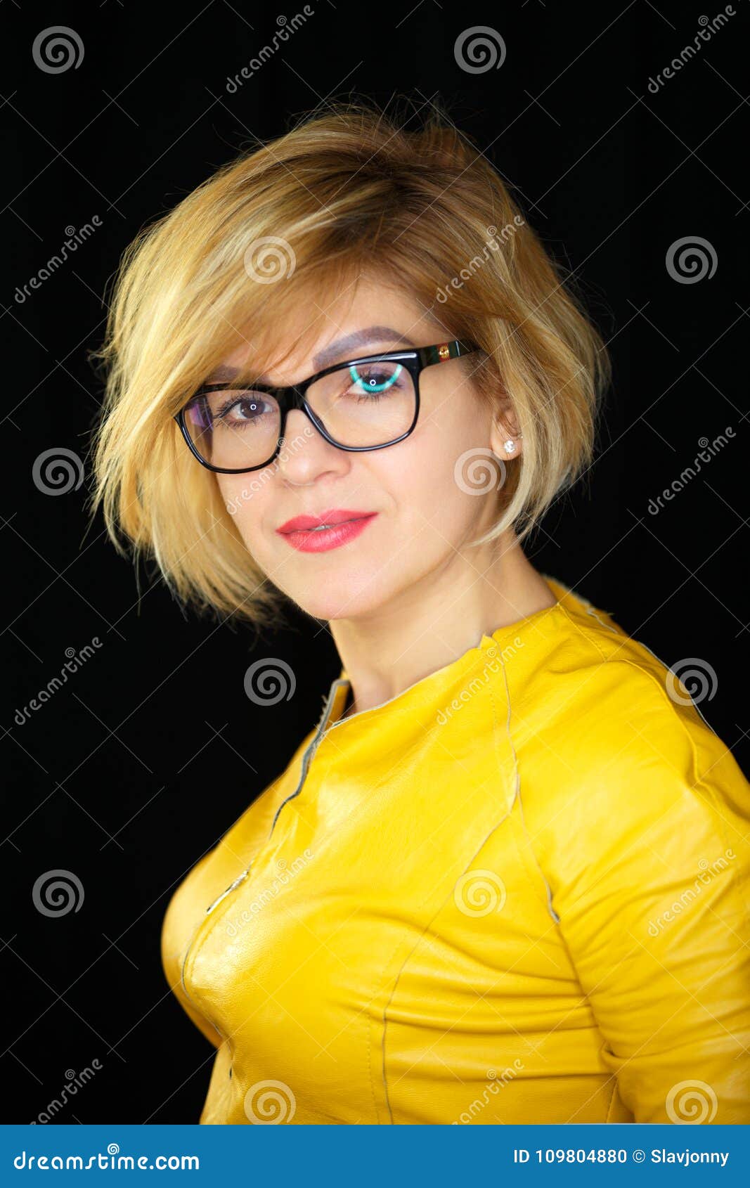 Portrait Of Beautiful Model With Short Blonde Hair On Black