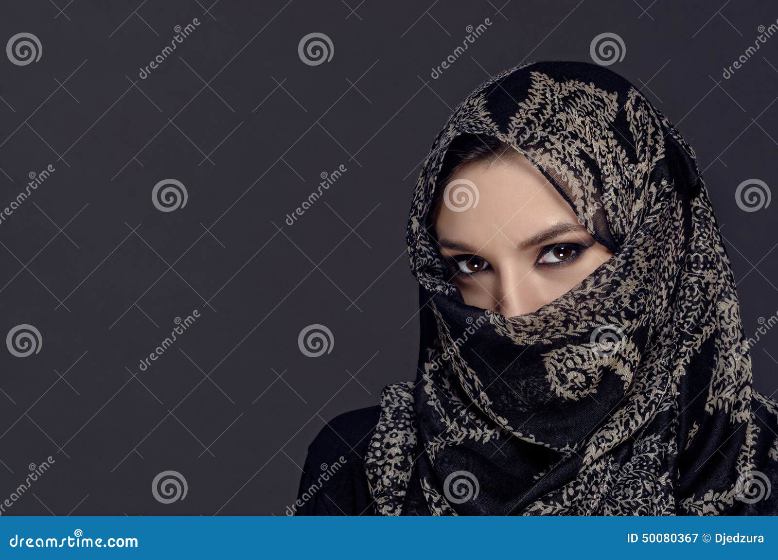 Portrait Of Muslim Beautiful Girl In Patterned Hijab 
