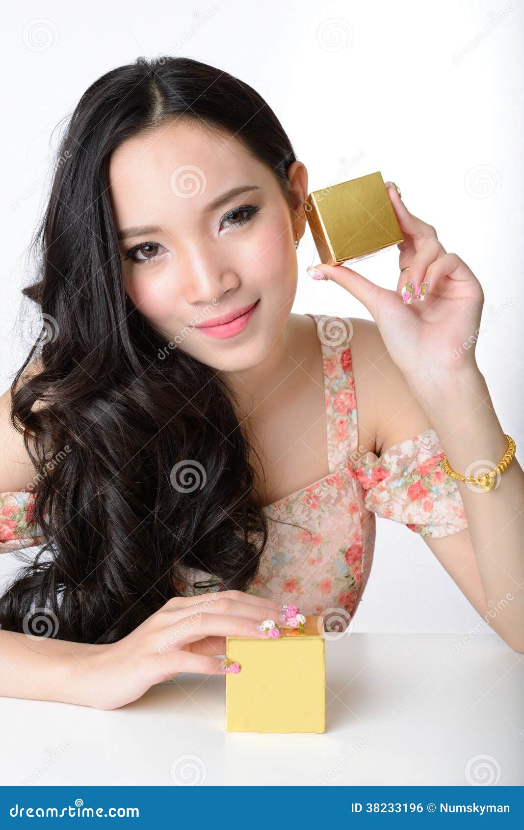 Portrait of Beautiful Smiling Asian Woman Model is Holding Cosmetic ...