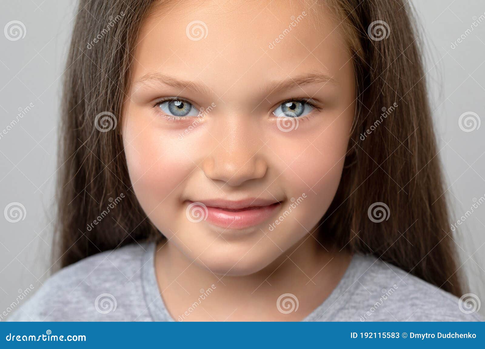 Portrait of a Beautiful Smiling Girl with Blue Eyes, with Light Brown Hair.  she Looks into the Camera Stock Image - Image of daughter, cosmetician:  192115583