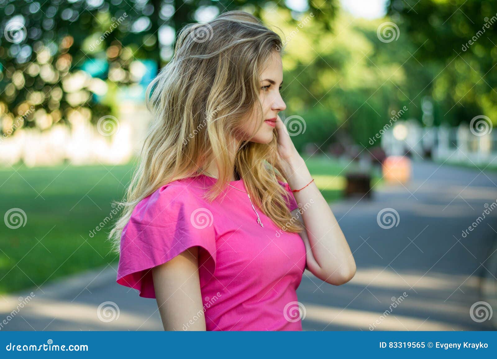 Portrait of a Beautiful Smiling Young Cute Girl in a Pink Summer Dress ...