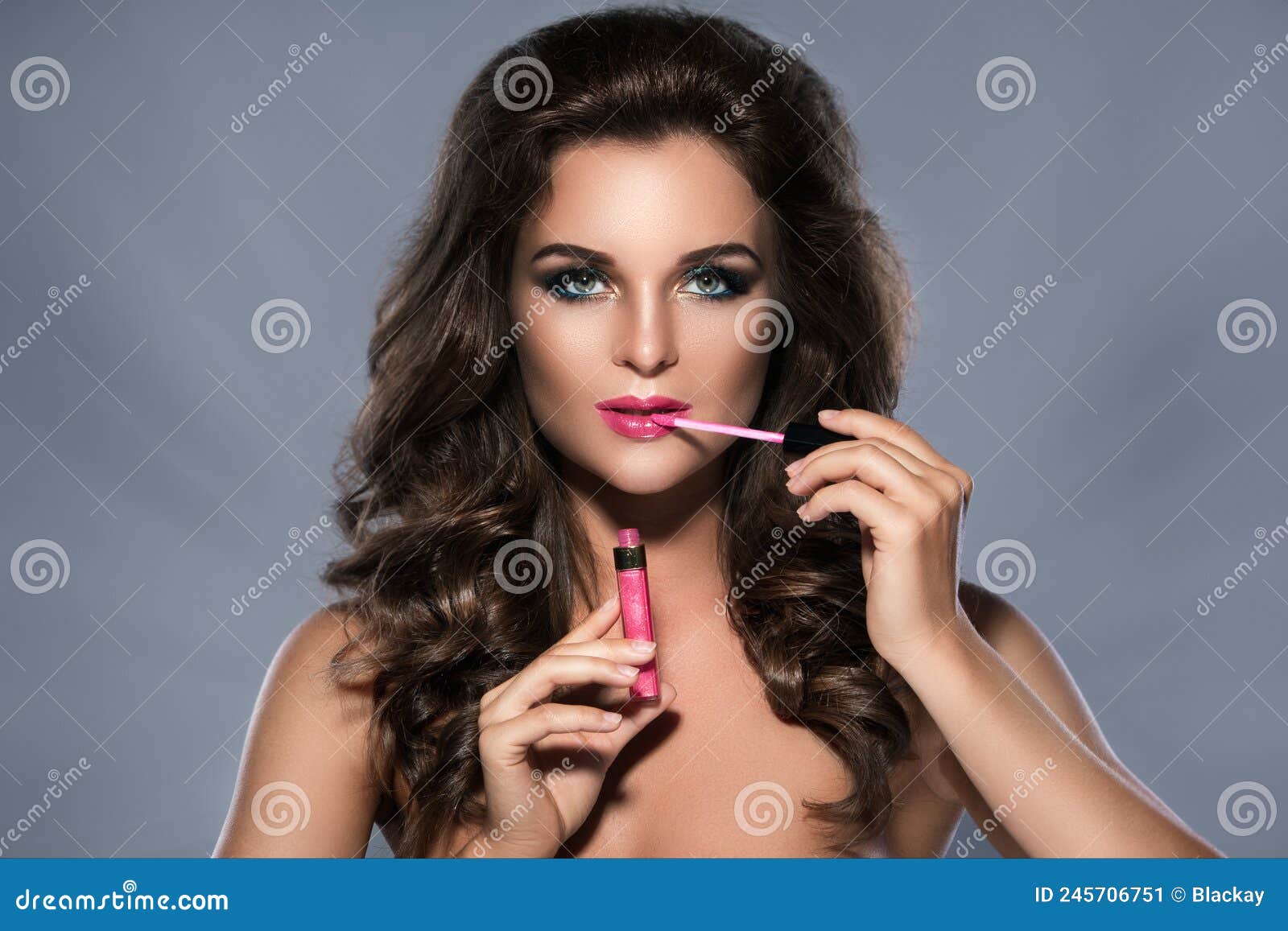 Portrait Of Beautiful Woman Applying Lip Gloss Stock Image Image Of Lipgloss Bright 245706751