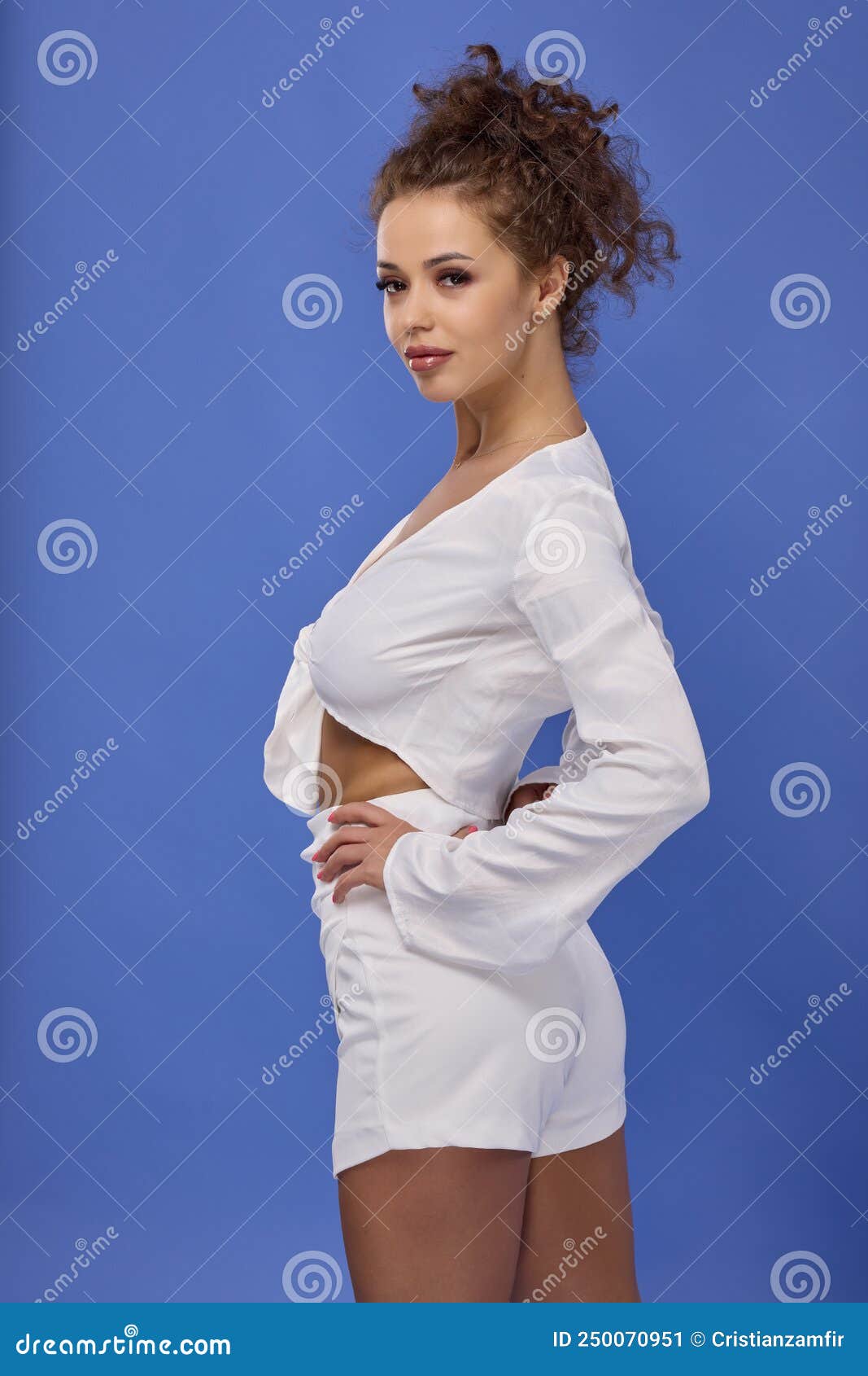 A Beautiful Woman With Curly Hair On A Blue Background Stock Image Image Of Face Eyes 250070951 