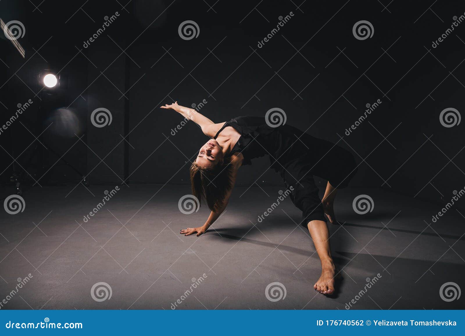 Portrait Of A Beautiful Woman Dancing On Black Background. Ballet And ...