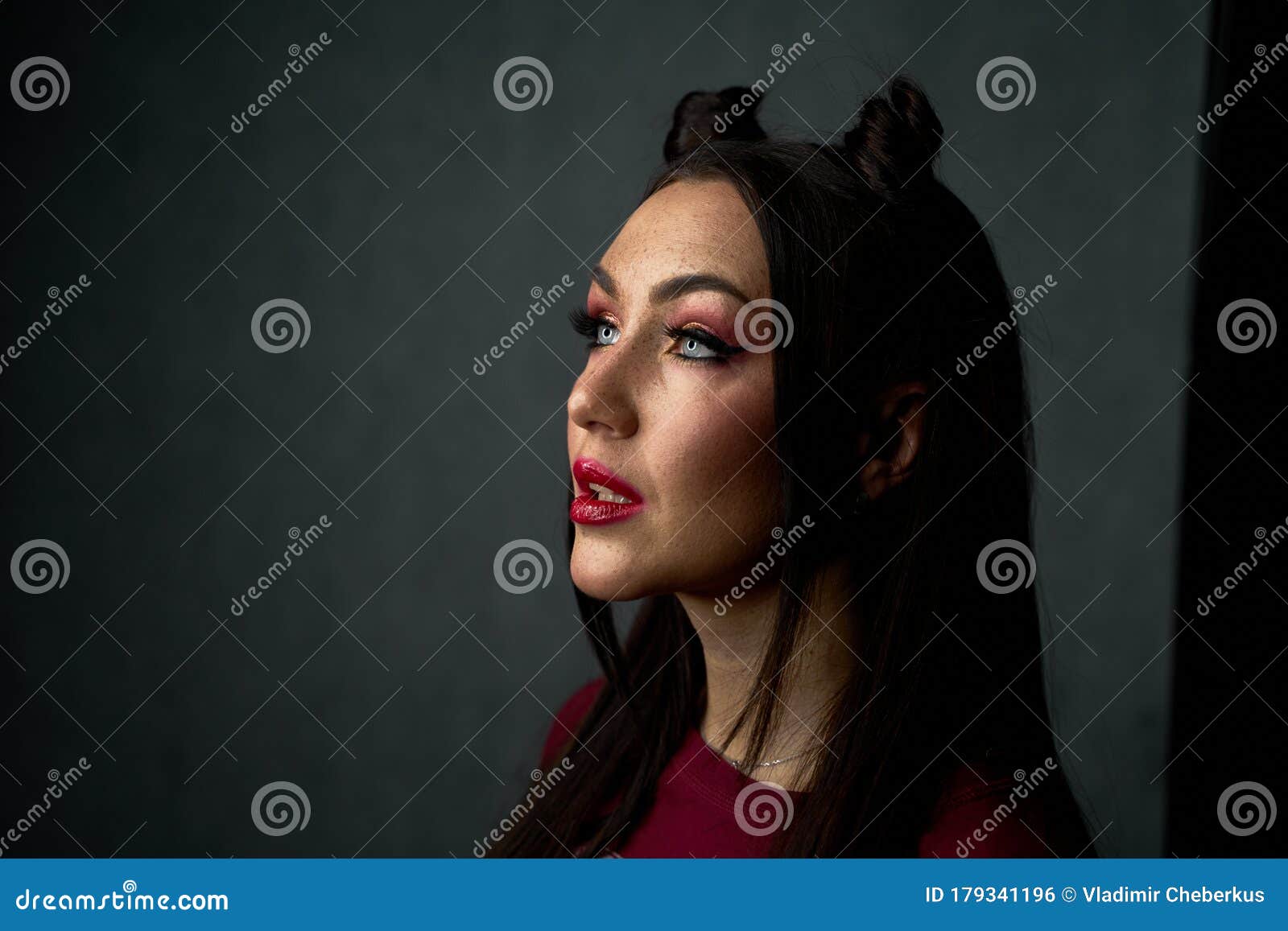 Portrait of a Beautiful Woman Face with Blue Eyes Make-up. Stock Photo ...