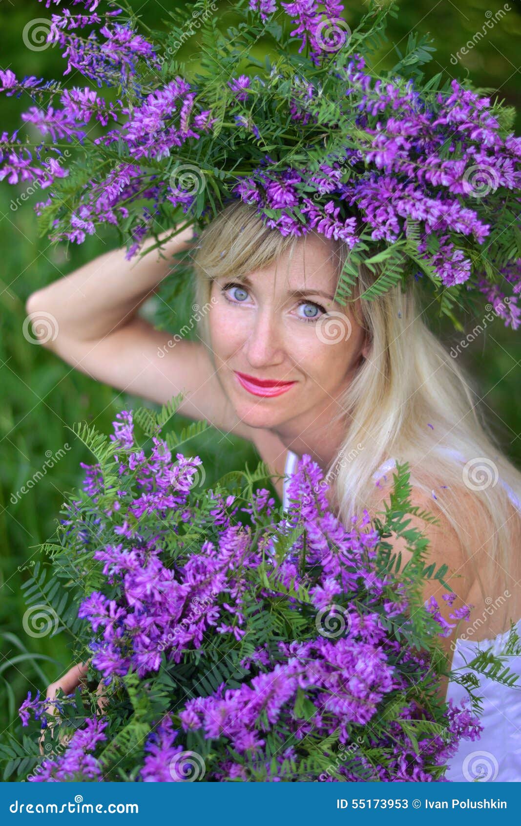 portrait the beautiful woman with flowers