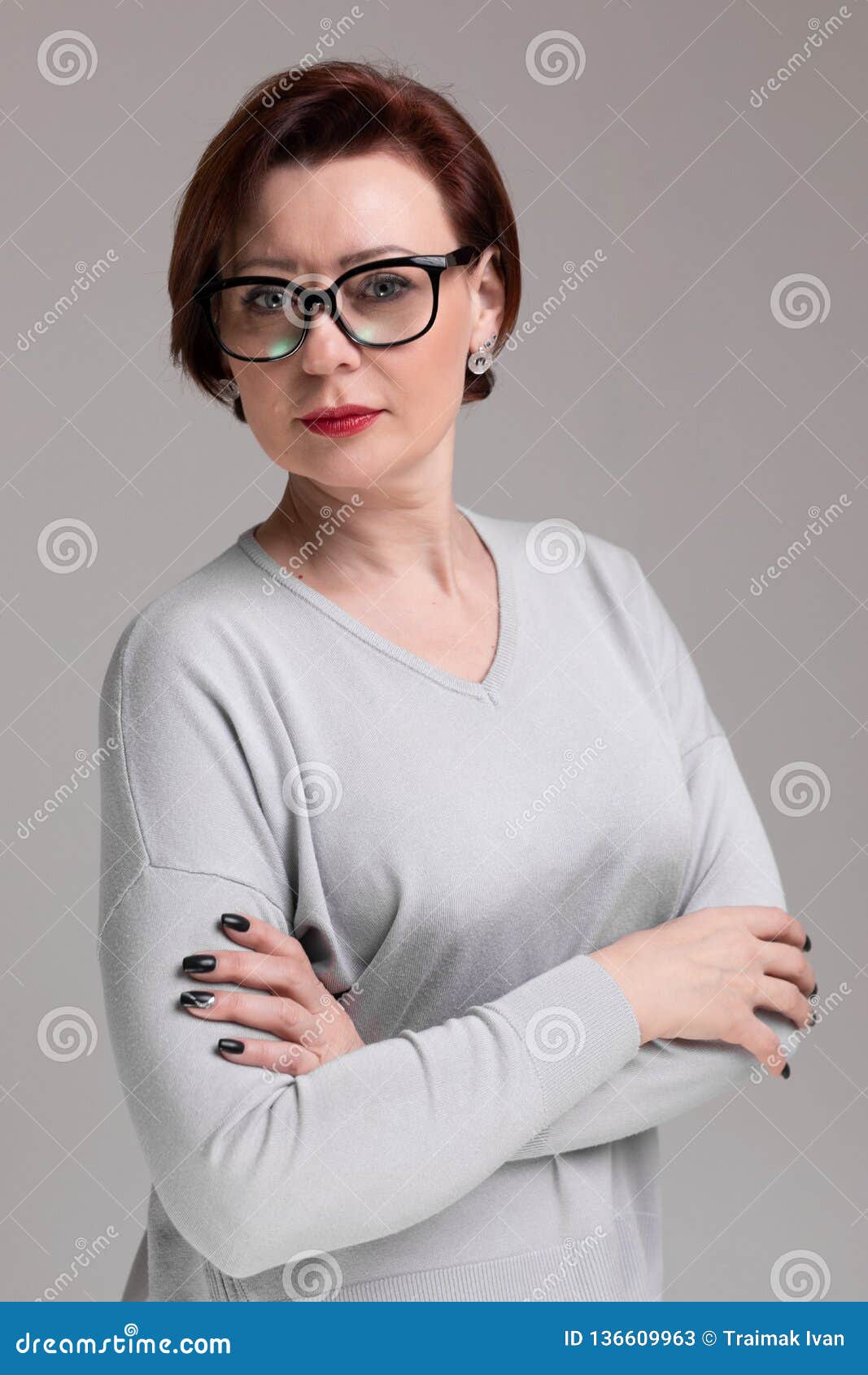 Portrait Of Beautiful Woman With Glasses Isolated On Light