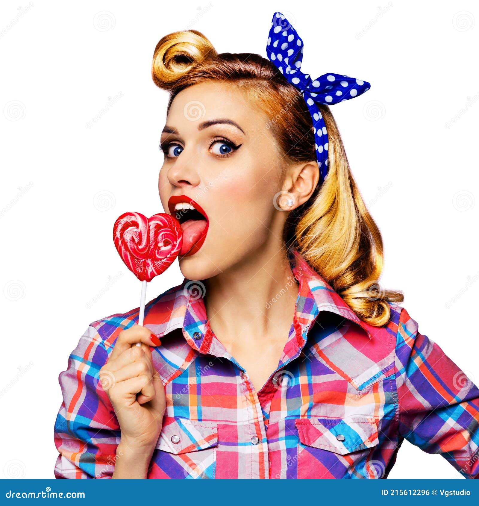 Woman Licking Heart Shape Lollipop Dressed In Pinup Style Plaid Shirt 