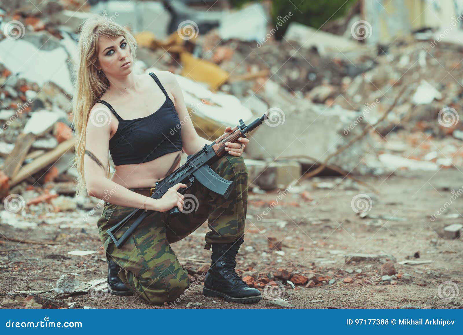 Topless Women Shooting Guns