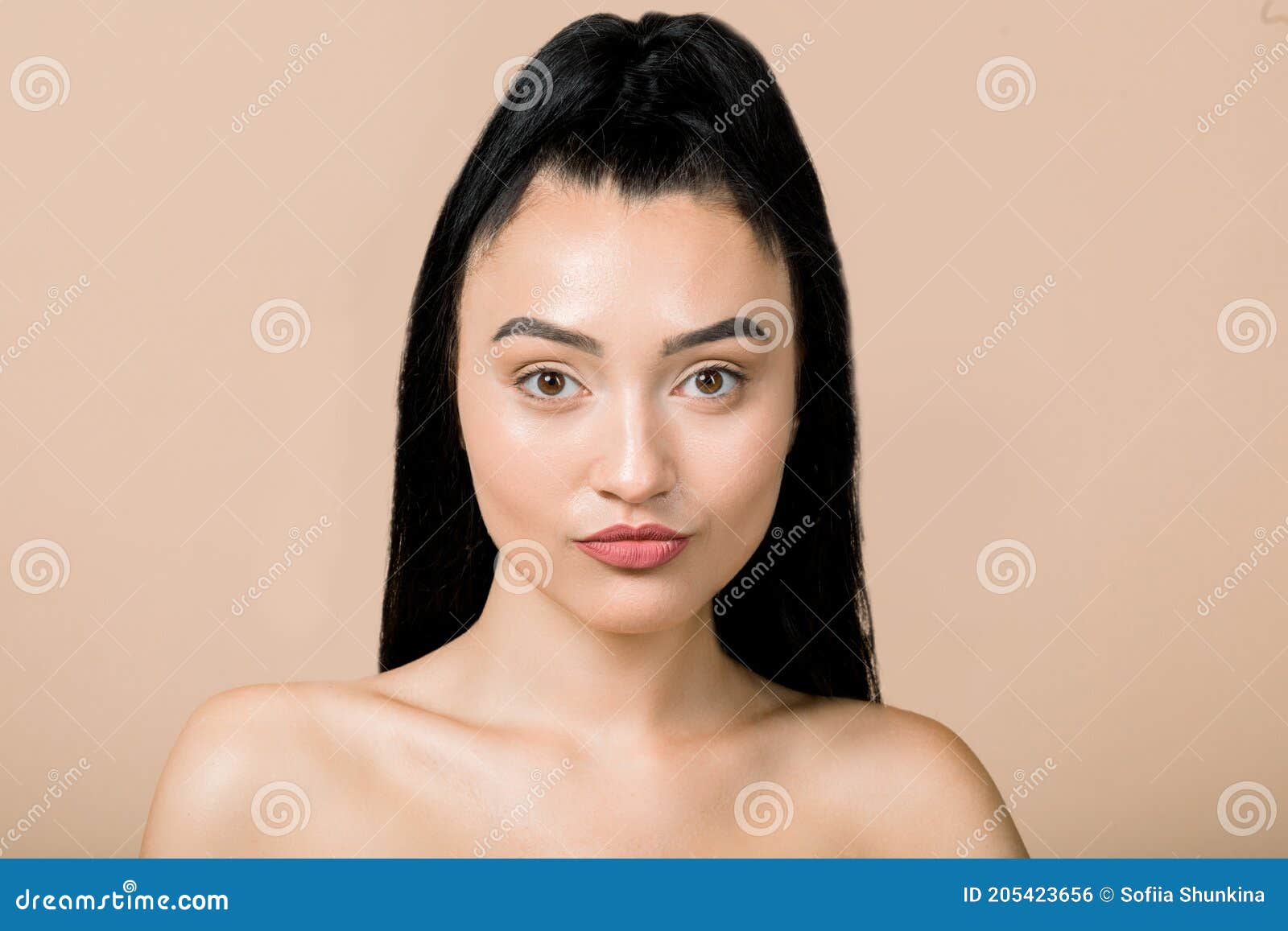 Portrait Of Beautiful Young Asian Woman With A Black Healthy Hair In