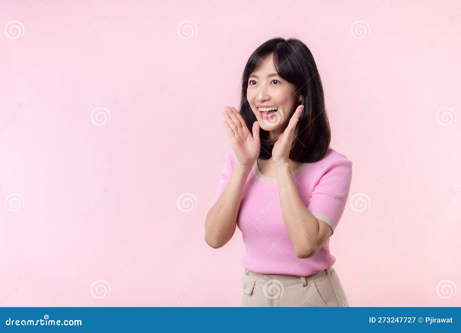 portrait beautiful young asian woman expression yel scream announce news of communication message or shout loud voice with hand