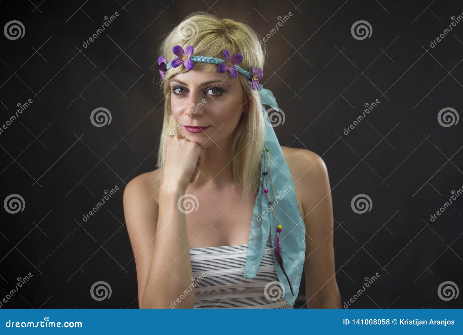 Portrait Of Beautiful Young Woman Wearing Hippie Headband