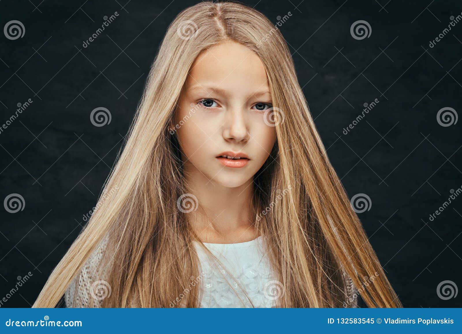 Close-up of a young girl with blonde hair - wide 10