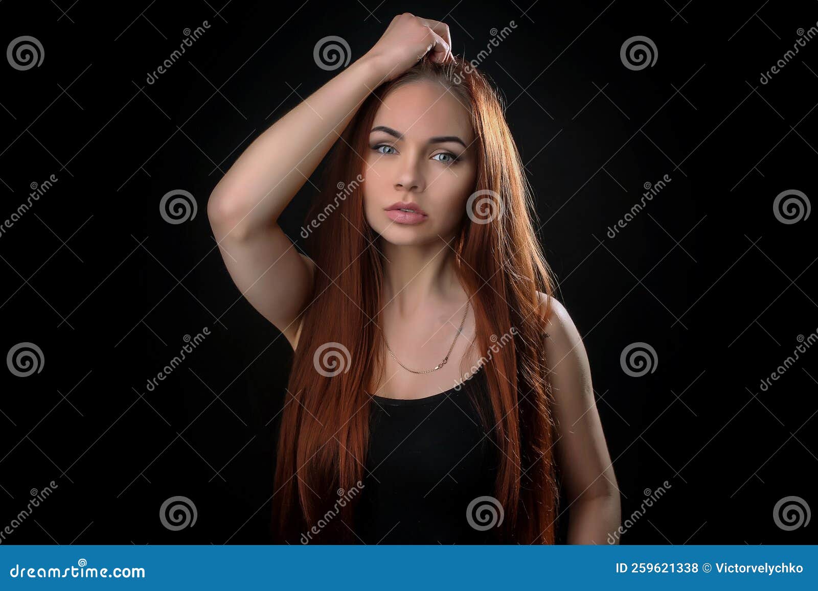 Portrait of a Beautiful Young Red-haired Girl on a Dark Black Background in  the Studio, with a Cleavage and Big Breasts in Black Stock Photo - Image of  glamour, redhaired: 259621338