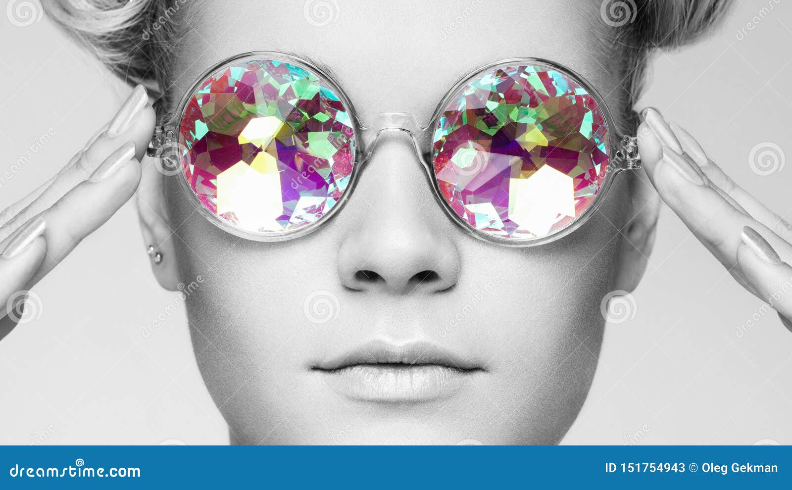 portrait of beautiful young woman with colored glasses