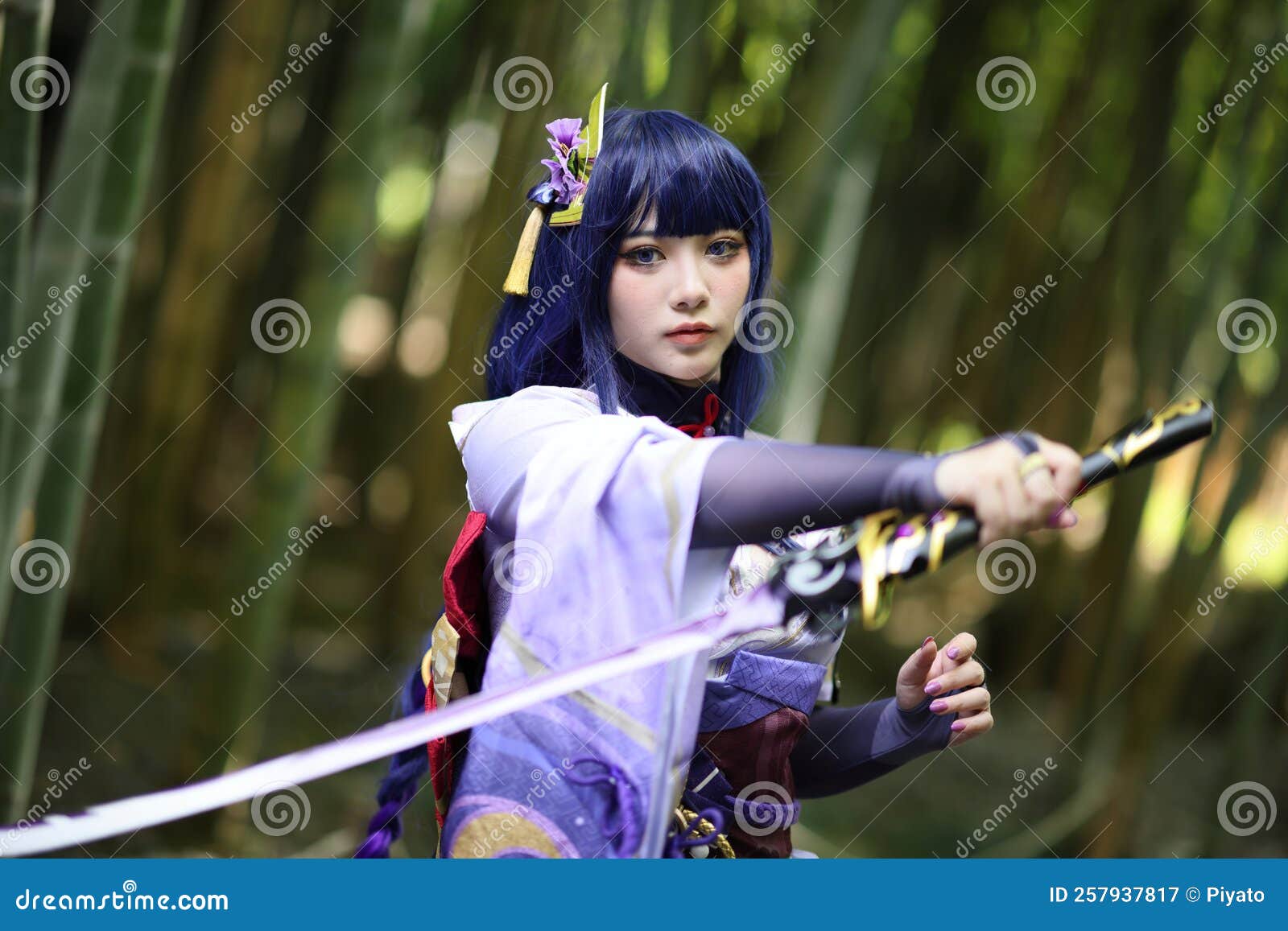 Portrait Of A Beautiful Young Woman Game Cosplay With Samurai Dress Costume  On Japanese Garden Stock Photo - Download Image Now - iStock