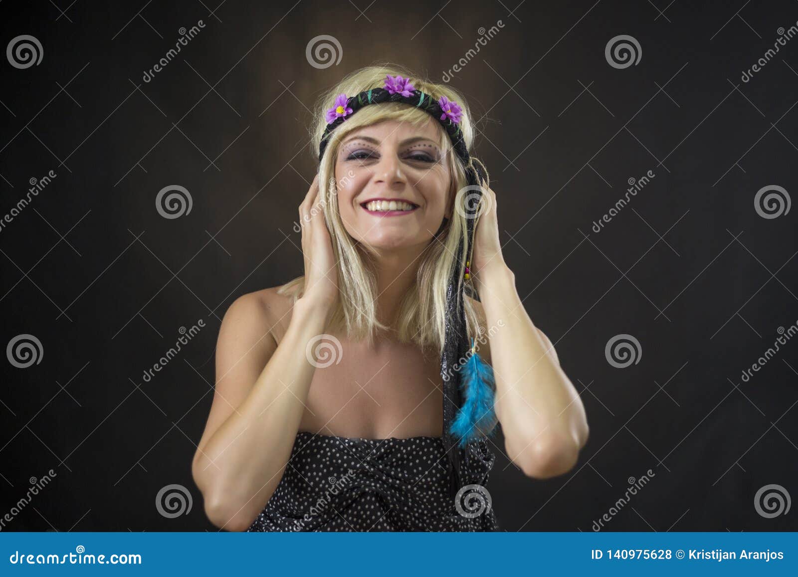 Portrait Of Beautiful Young Woman Wearing Hippie Headband