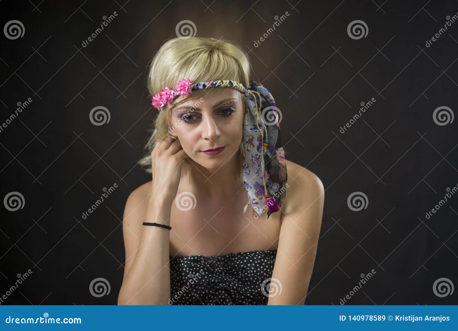 Portrait Of Beautiful Young Woman Wearing Hippie Headband