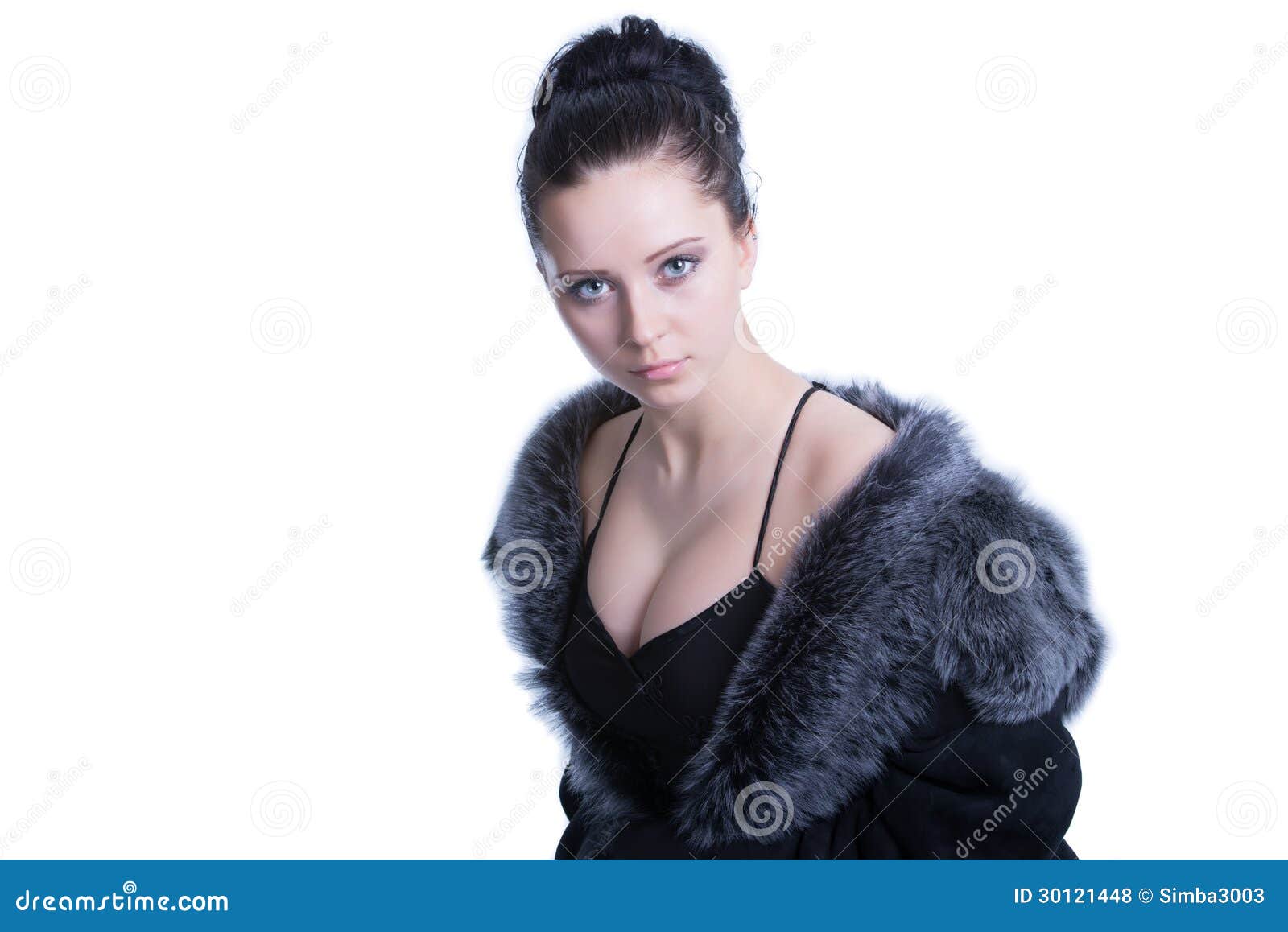 beautiful woman with decollete in luxury black fur