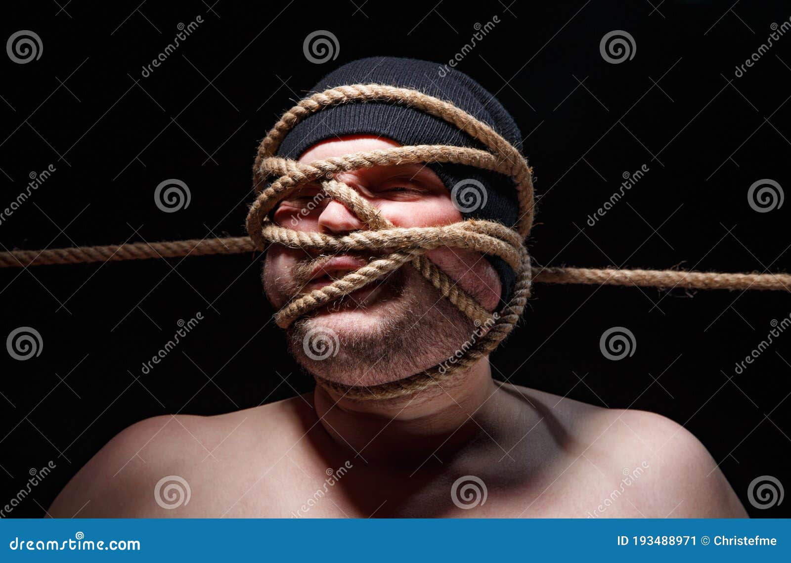 Portrait of Binded Fat Man with Rope on Face Stock Image - Image