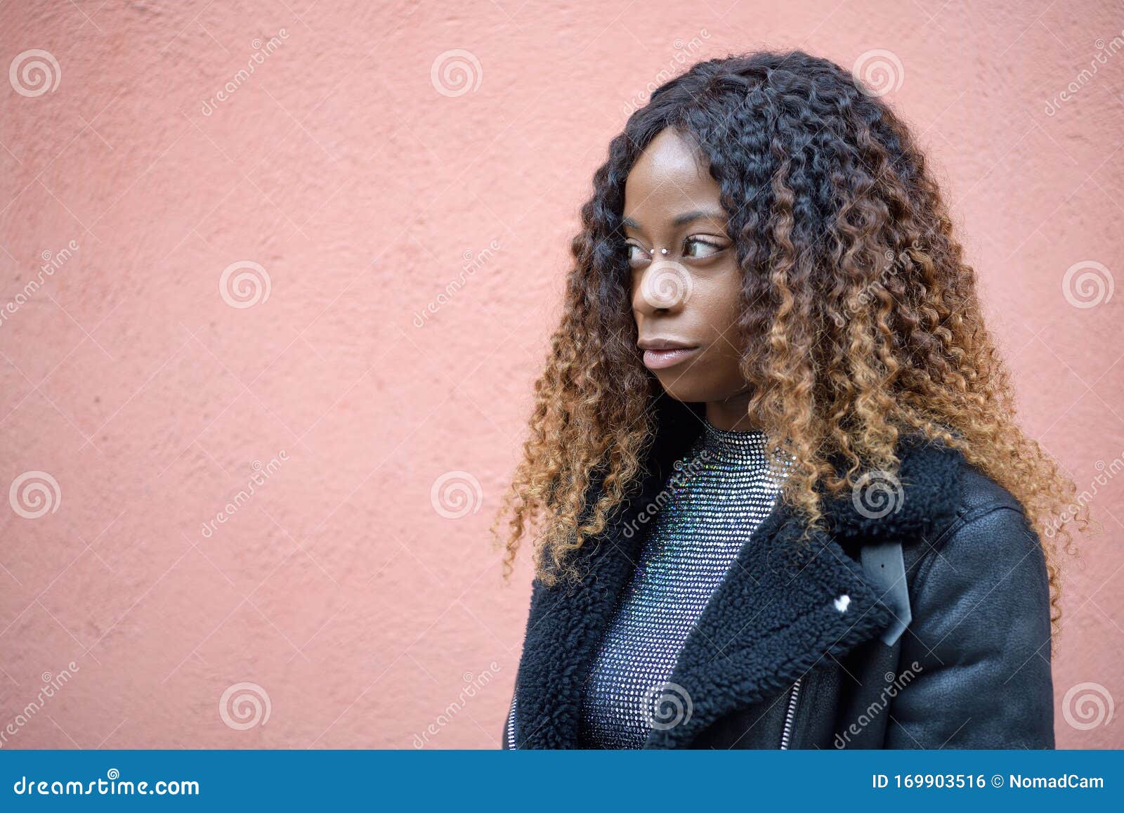 Portrait of a Black Afro Girl with Curly Brown Hair Daydreaming and Looking To the Left on a Rough Background Stock Photo - Image of piercing, curly: 169903516 Portrait of a Black Afro Girl with Curly Brown Hair Daydreaming and Looking To the Left on a Rough Background Stock Photo - Image of piercing, curly: 169903516
