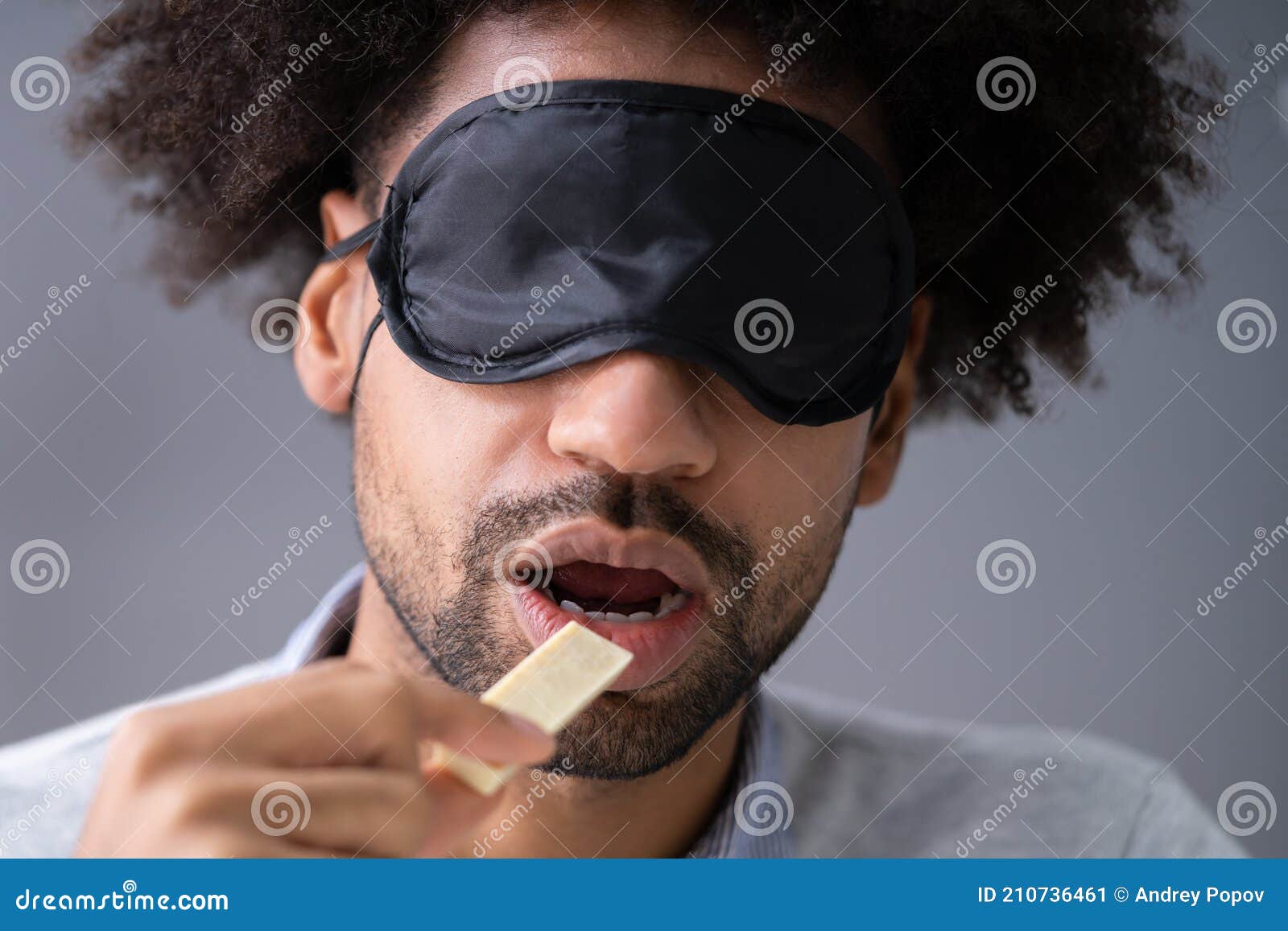 Portrait of Blindfolded Man Tasting Food Stock Image - Image of blindfold,  adult: 210736461