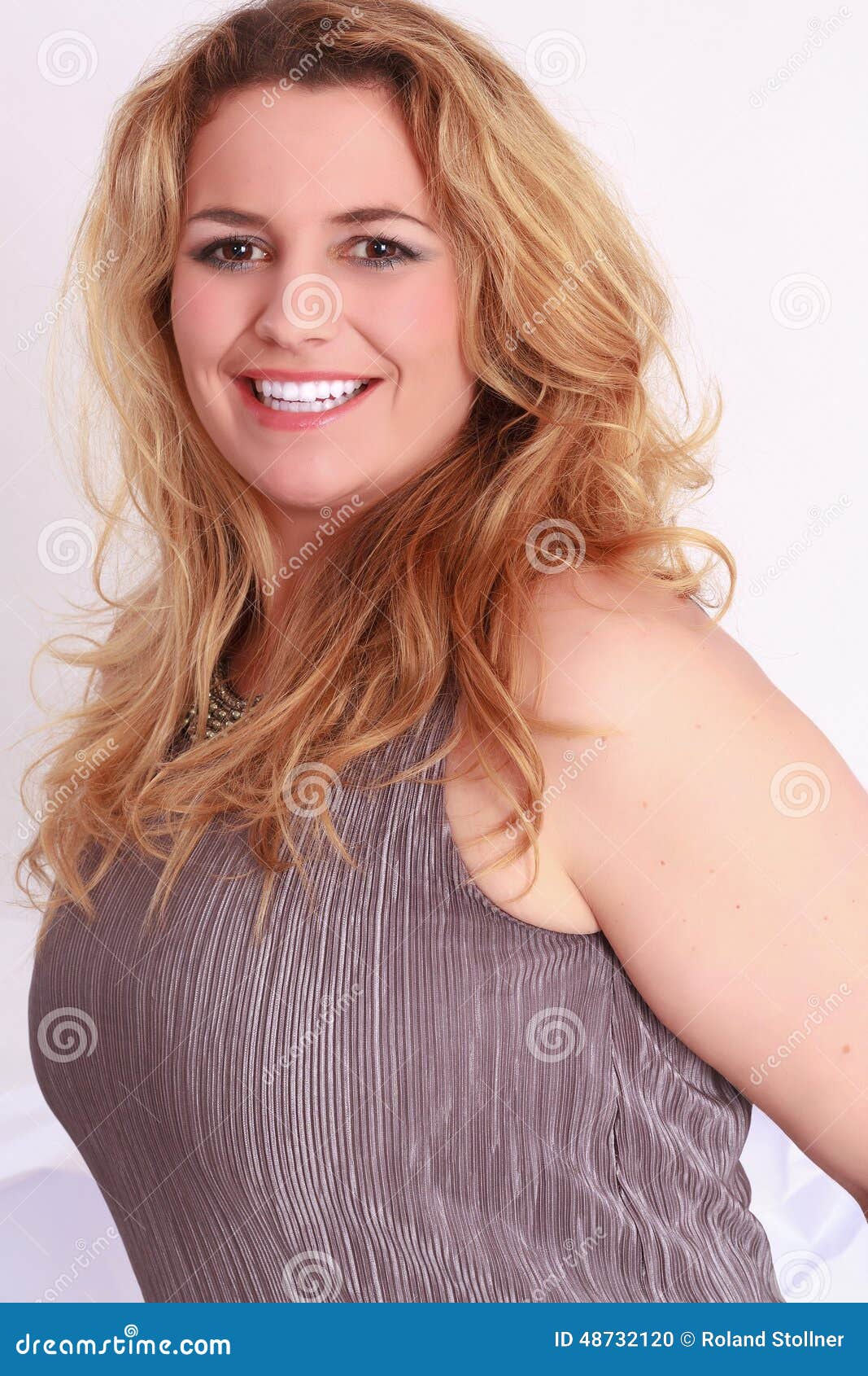 Portrait of a Blond Curly Woman with Big Boobs Stock Photo - Image of  grass, hair: 48732120