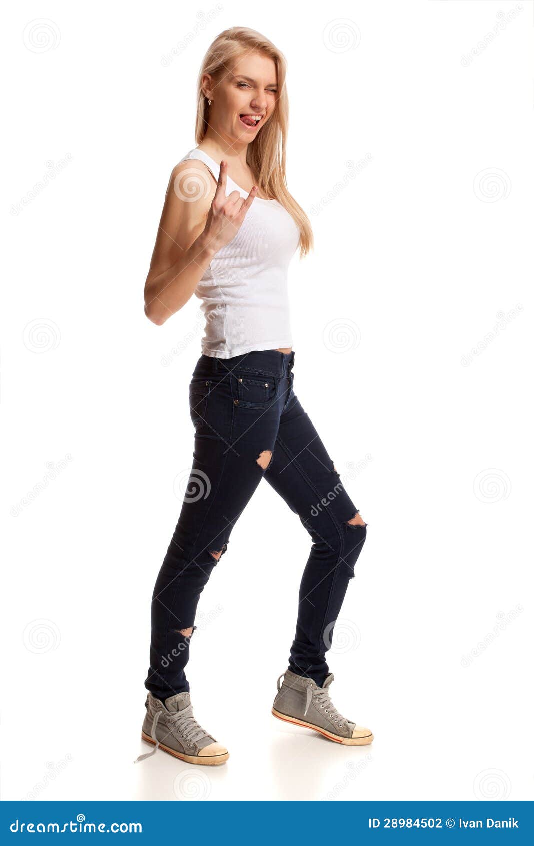 Portrait of Blond Teenage Gesturing Rock on Stock Photo - Image of ...