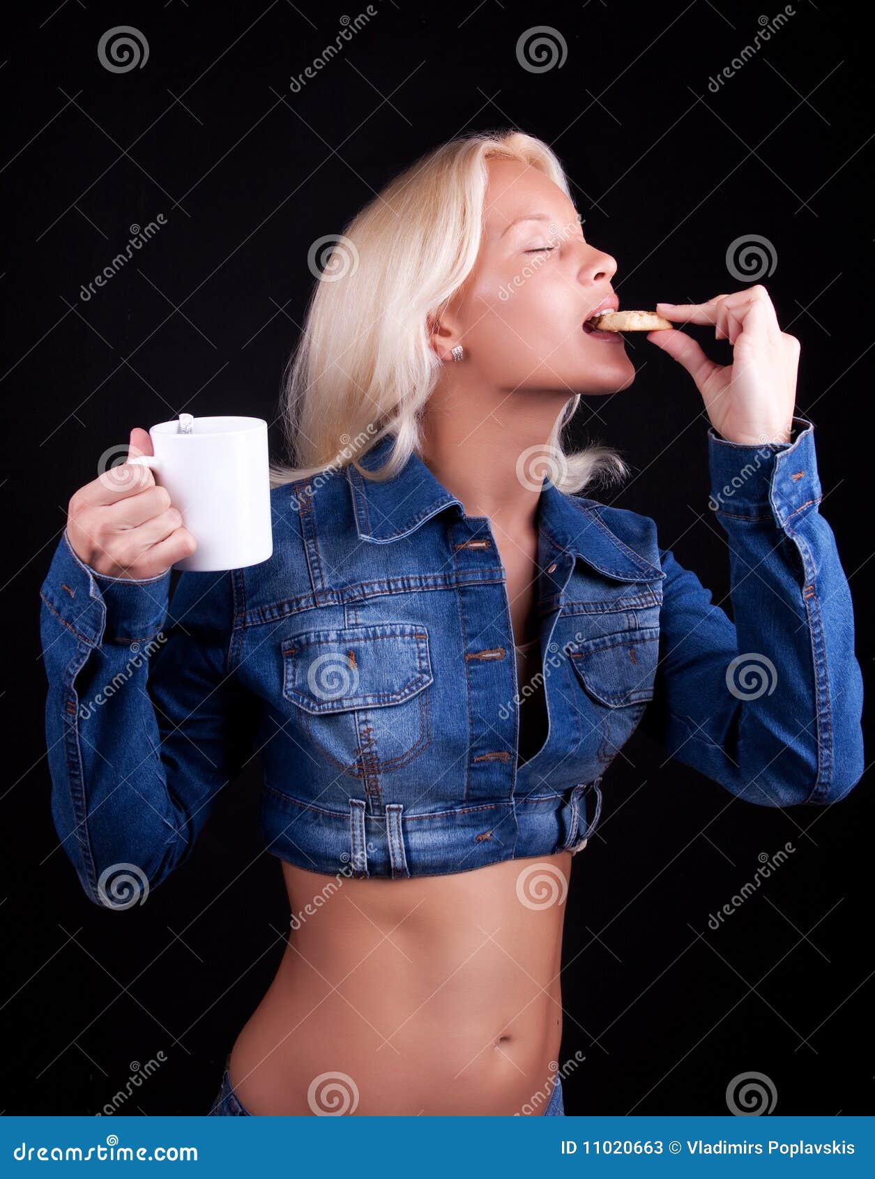 Portrait of Blonde Biting a Cookie Stock Image Image of hands, cloth