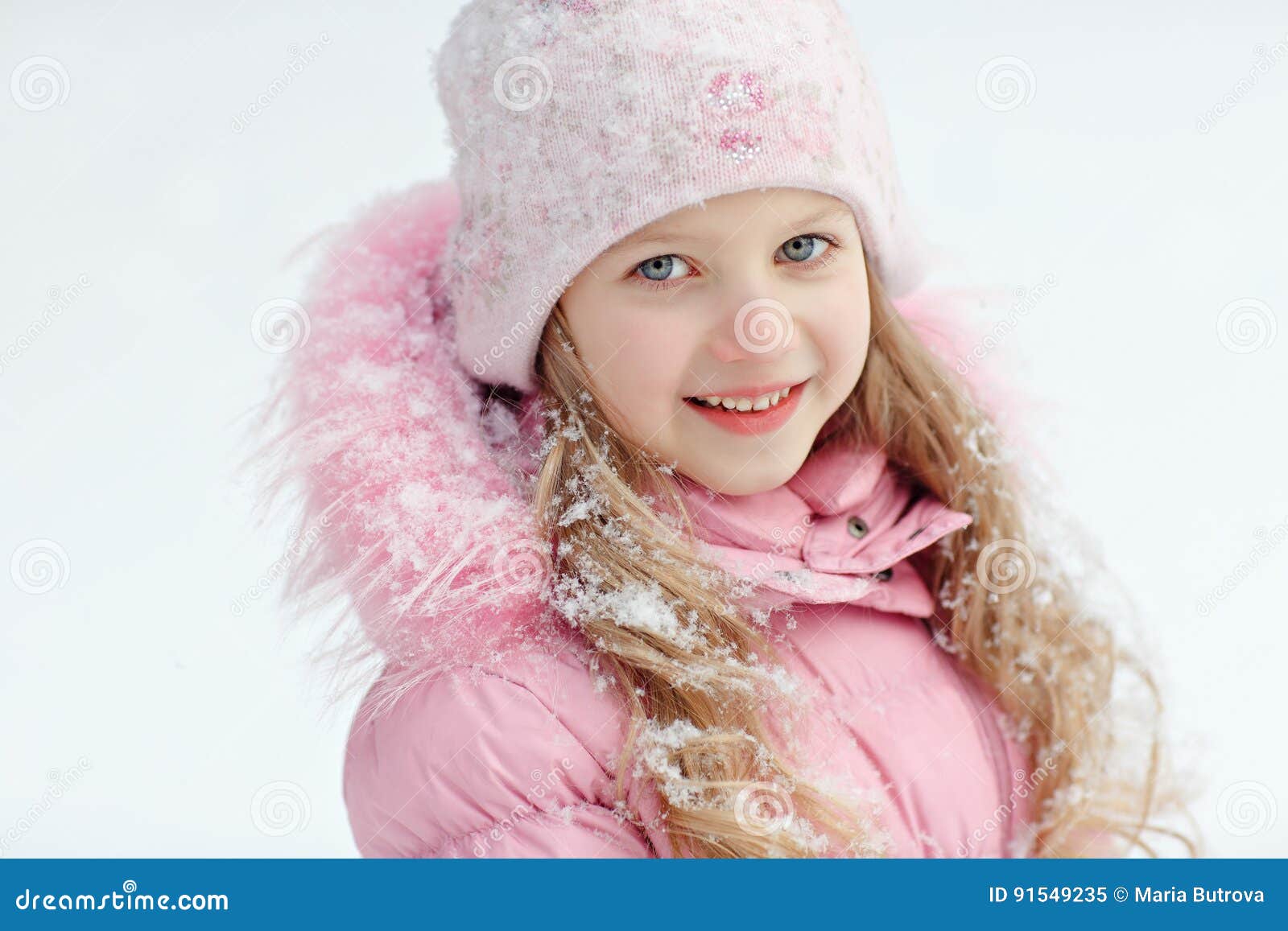 Portrait of a Blonde Girl in a Pink Jacket on a Light Background Stock ...