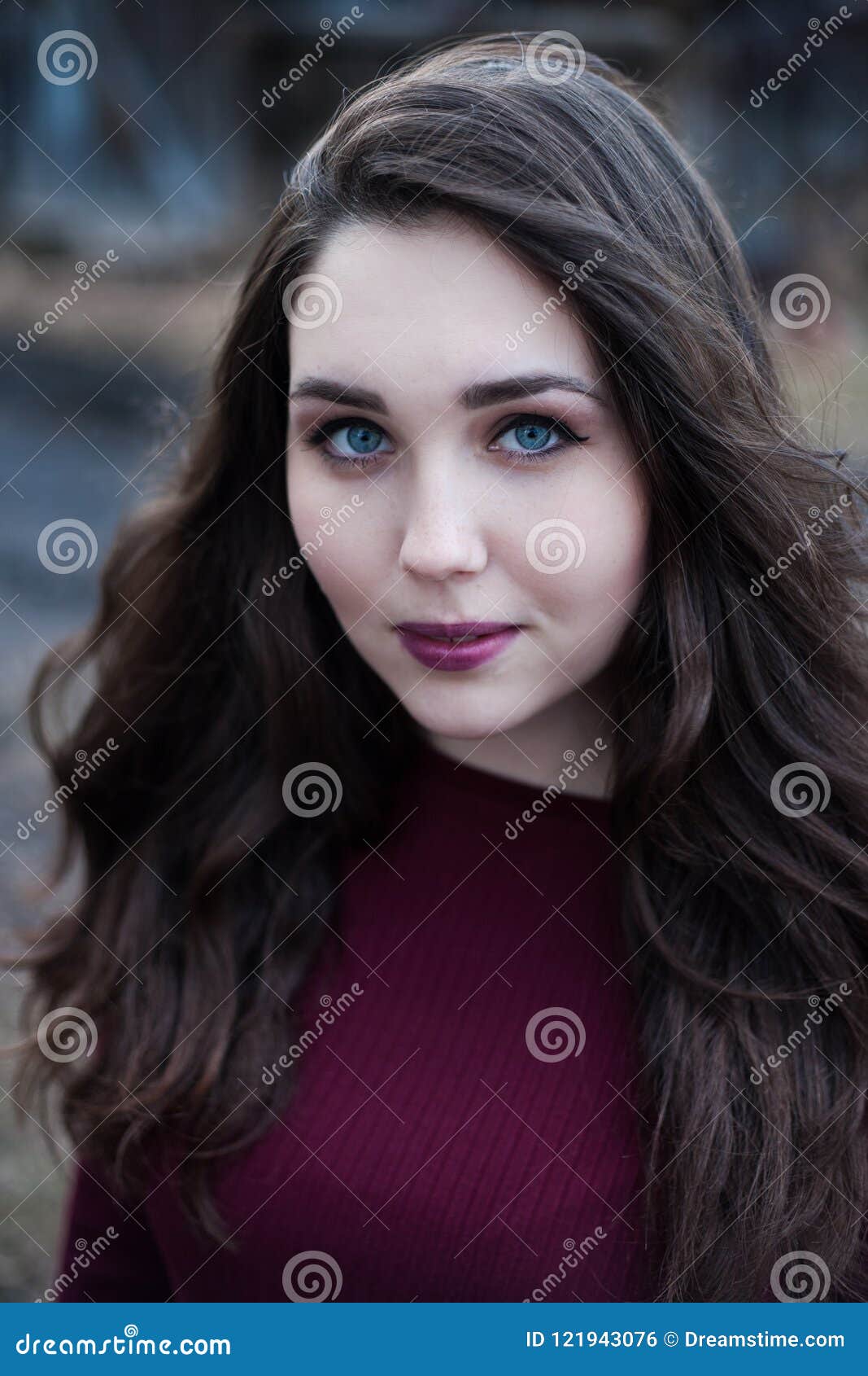 Portrait Of A Blue-eyed Girl With Dark Hair In Cherry ...