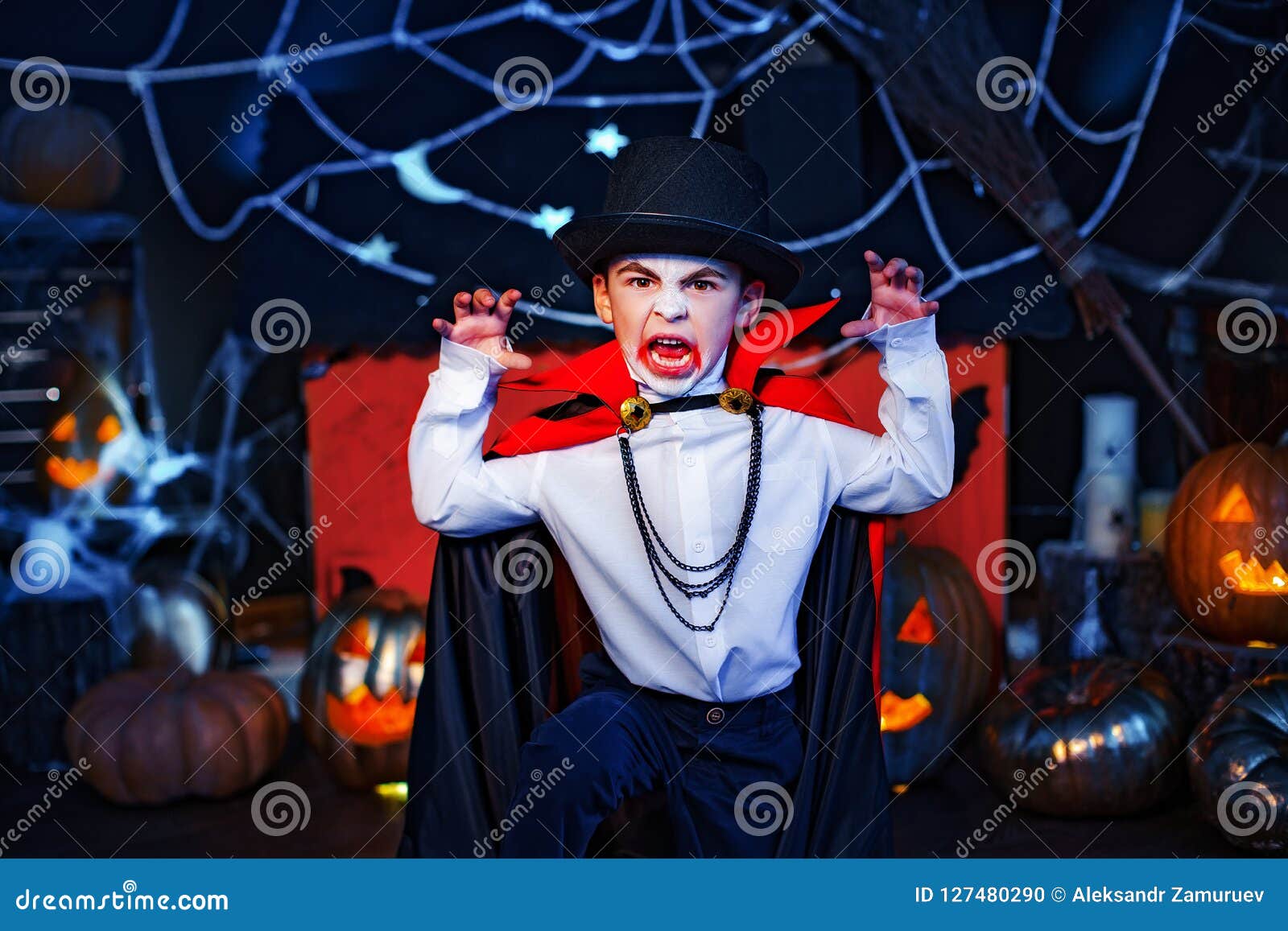 Portrait of a Boy Dressed in a Costume of a Vampire Over Grunge ...